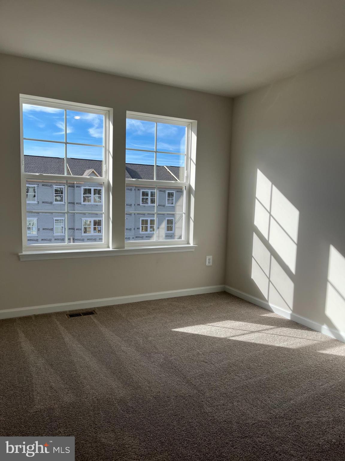 121 Canning Road Inwood, WV 25428 - Photo 30 of 38 an empty room with windows