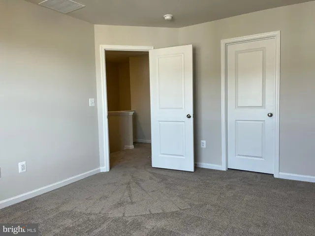 an empty room with closet