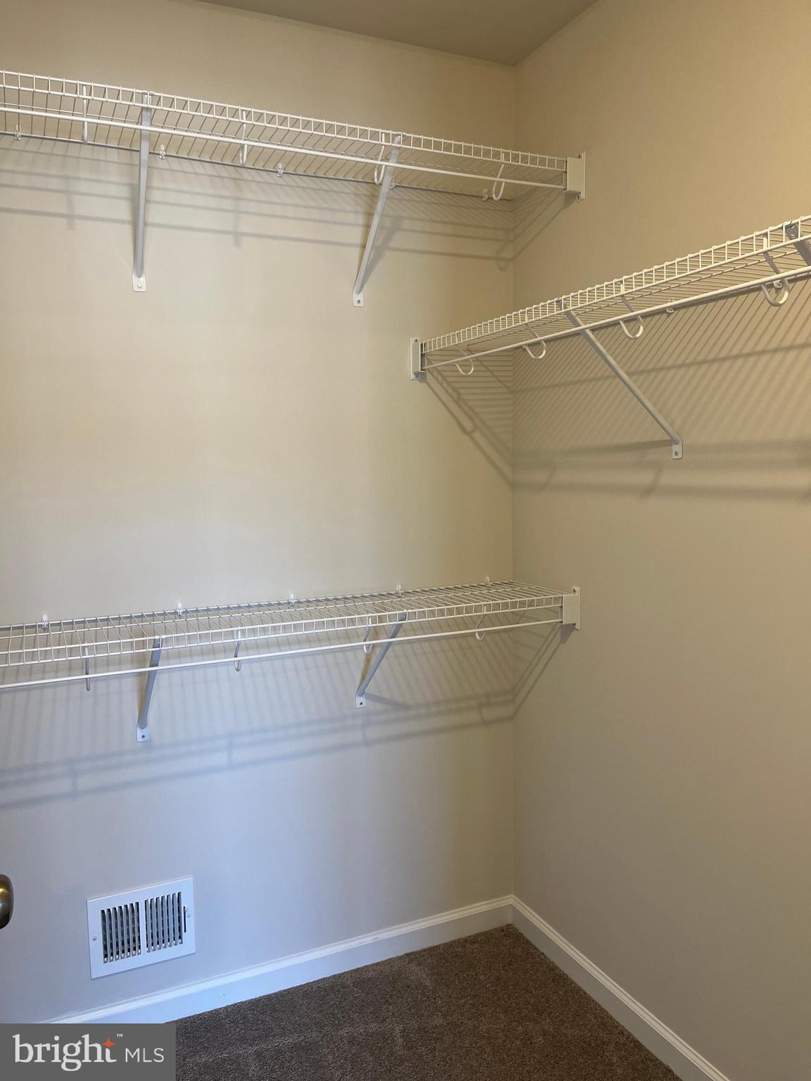 121 Canning Road Inwood, WV 25428 - Photo 35 of 38 a view of a room with racks on the wall