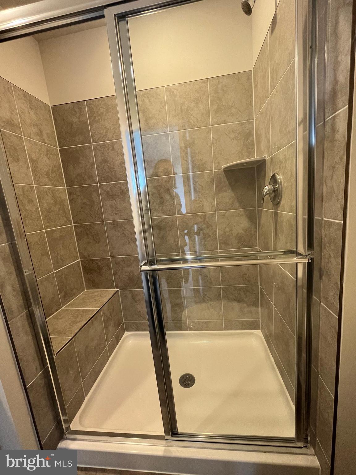 121 Canning Road Inwood, WV 25428 - Photo 37 of 38 a bathroom with a shower