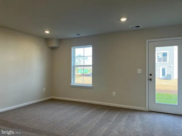 an empty room with window