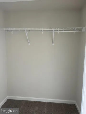 a view of small space with racks on the wall