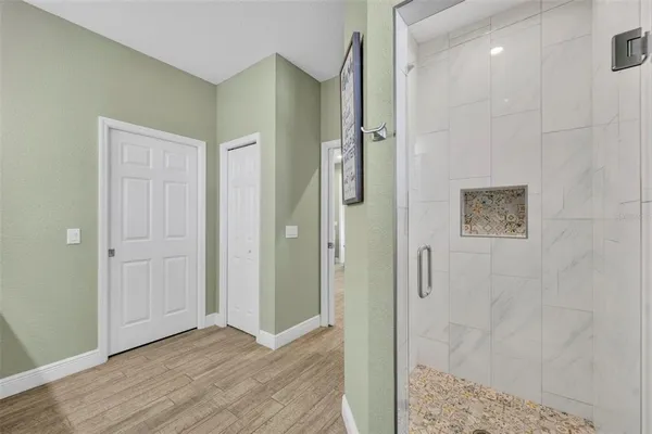 a view of a bathroom with shower