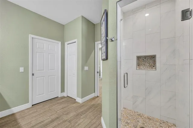 a view of a bathroom with shower