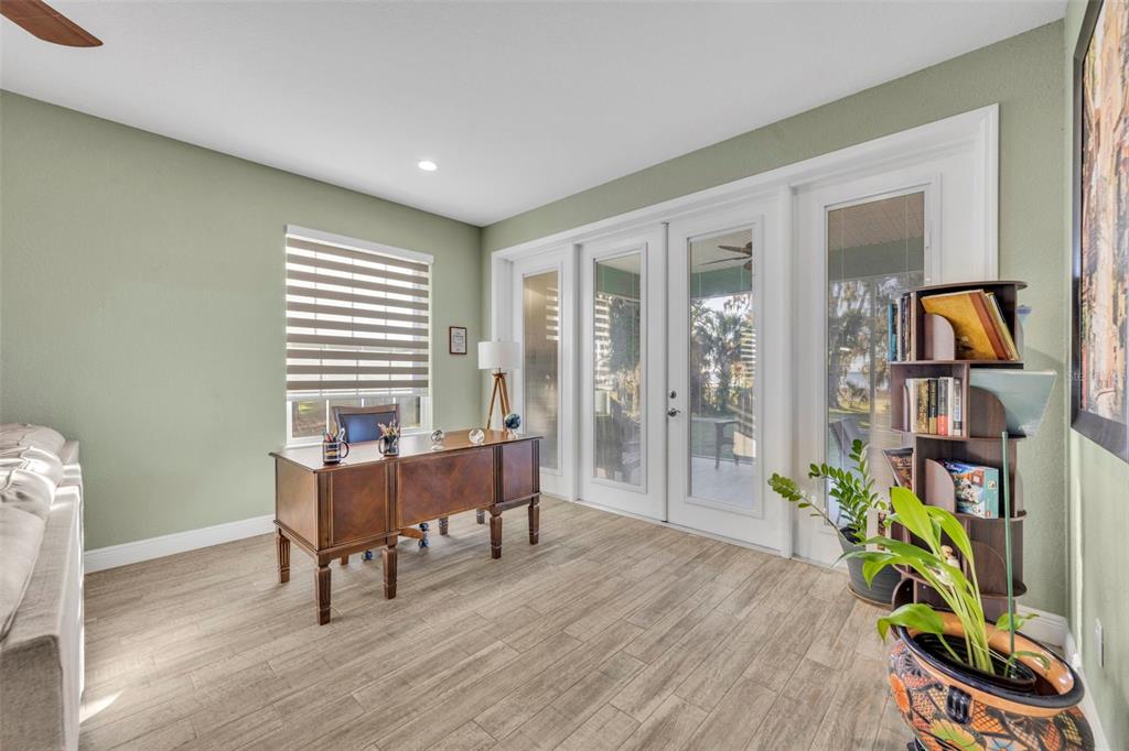 1947 North Lake Reedy Boulevard Frostproof, FL 33843 - Photo 18 of 31 a view of a workspace with furniture and a window