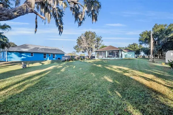 a view of house with garden
