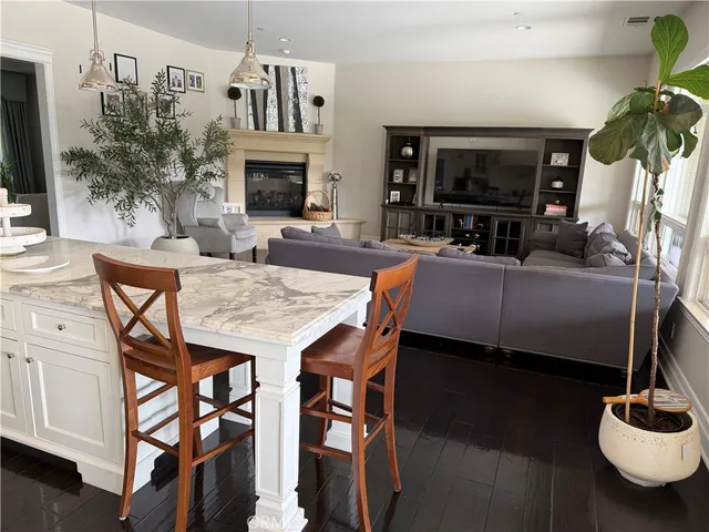 a view of a livingroom with furniture and a fireplace