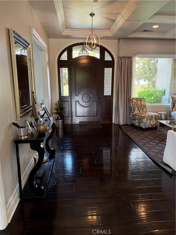 a view of a living room and dining room