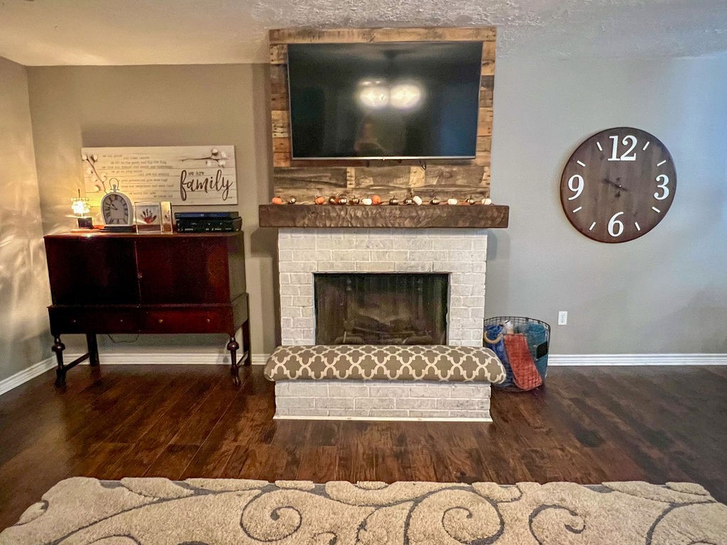 29922 Hegar Road Hockley, TX 77447 - Photo 12 of 19 a living room with furniture and a fireplace