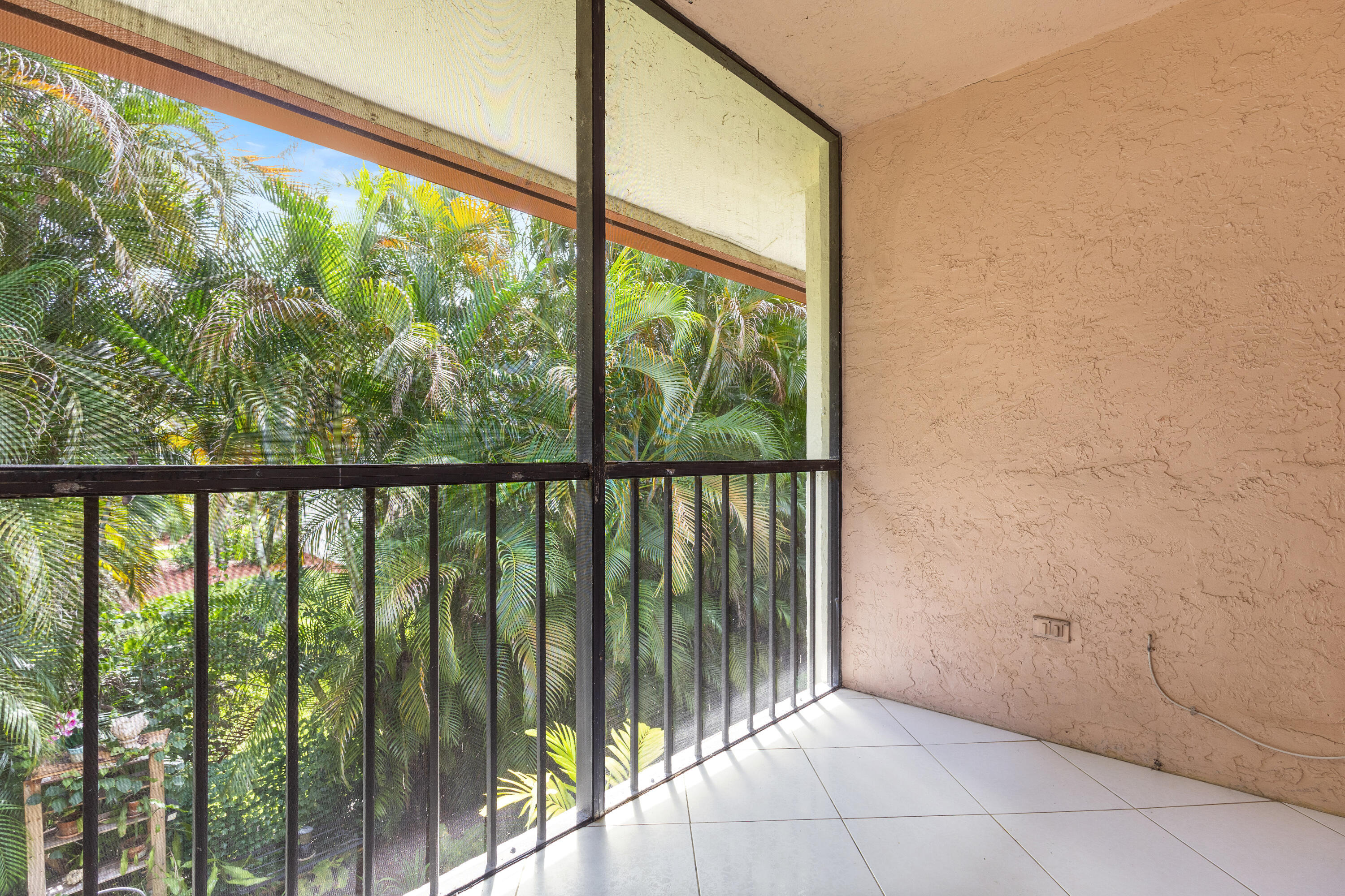 22076 Palms Way, Unit 202 Boca Raton, FL 33433 - Photo 11 of 35 a view of a porch
