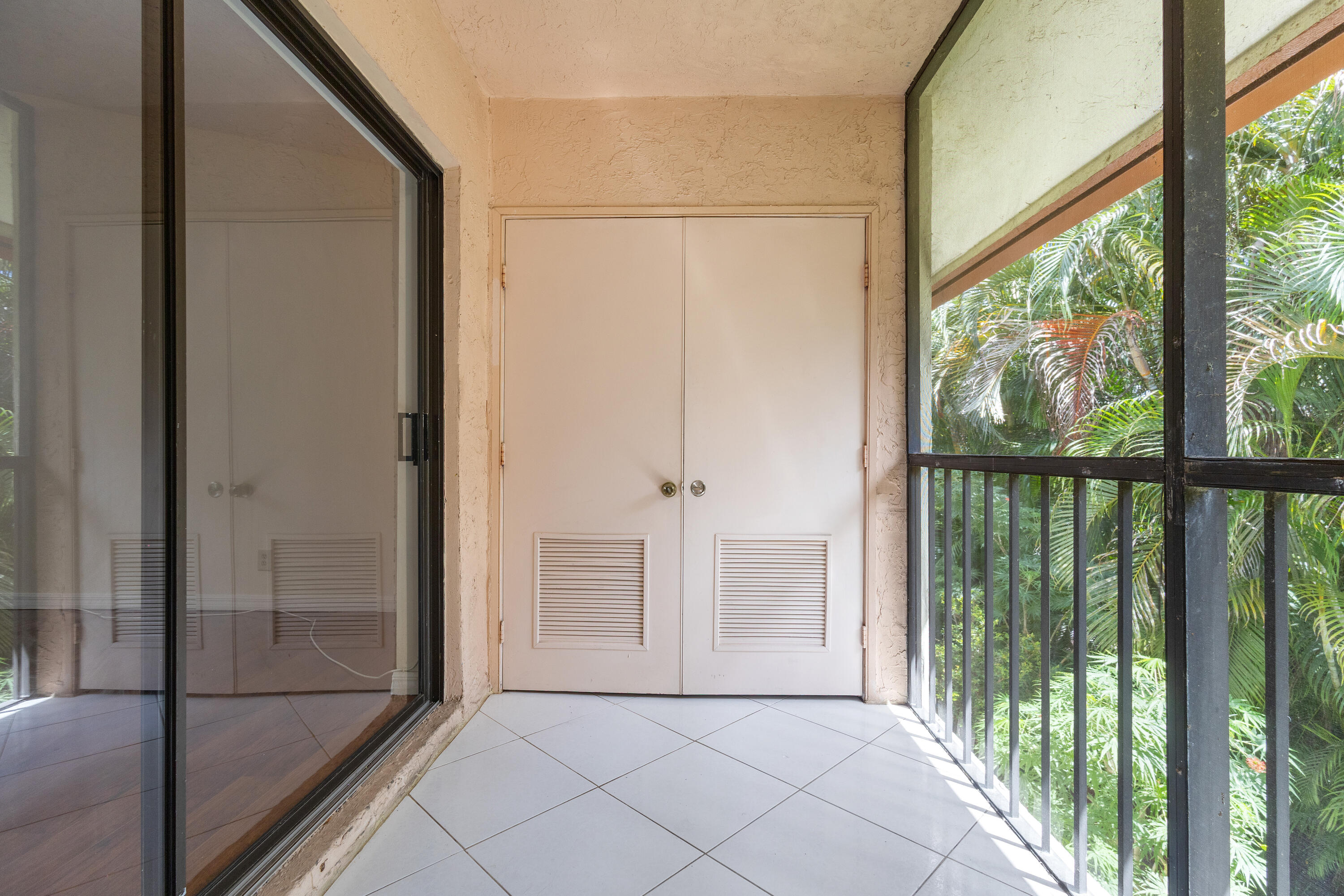 22076 Palms Way, Unit 202 Boca Raton, FL 33433 - Photo 12 of 35 a view of front door