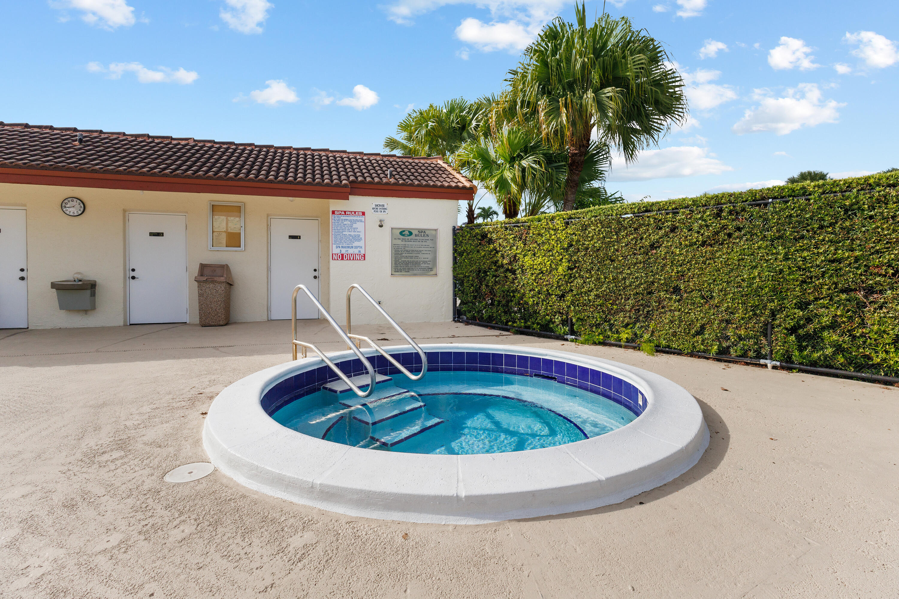 22076 Palms Way, Unit 202 Boca Raton, FL 33433 - Photo 29 of 35 a view of swimming pool with seating space