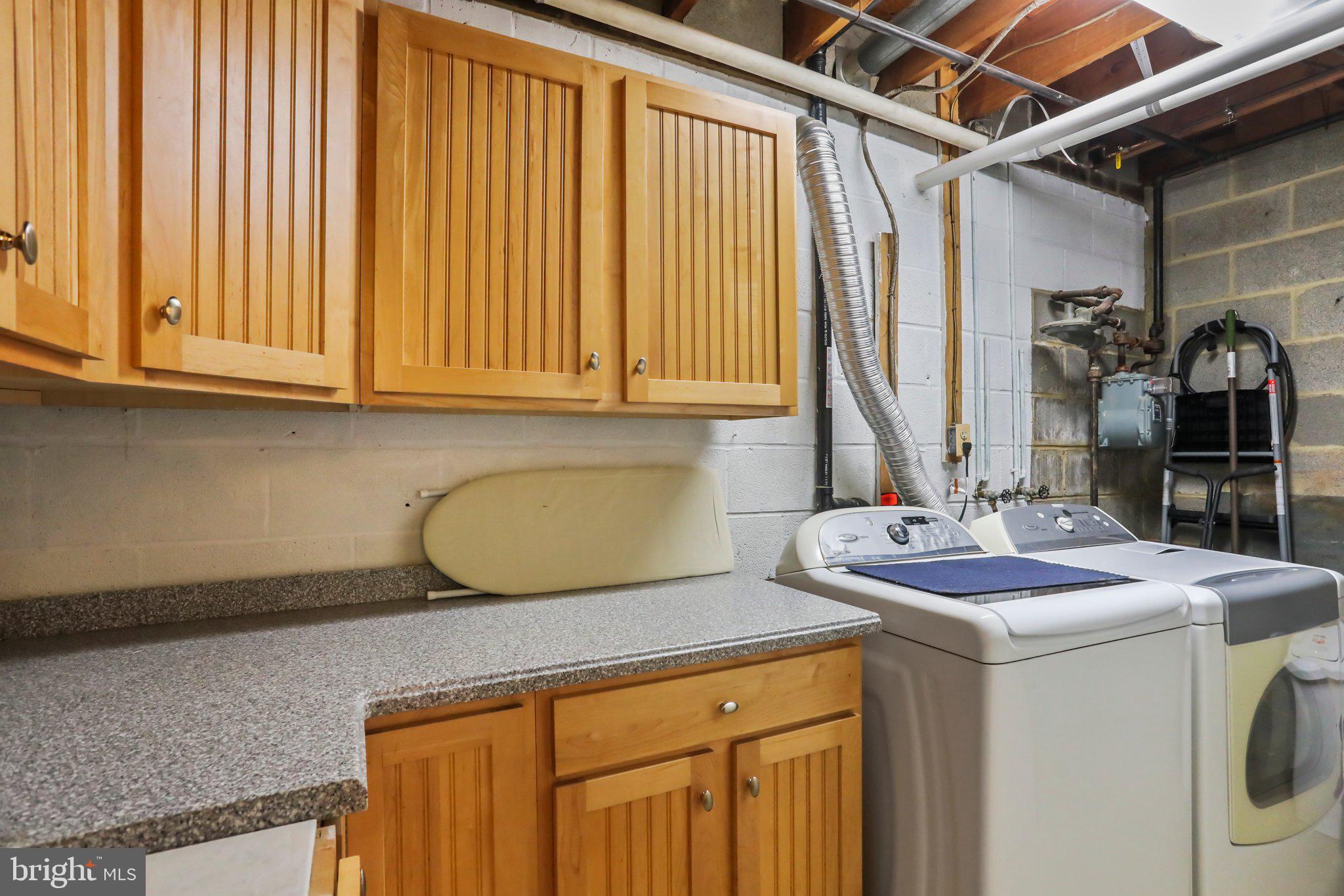 1634 Wainwright Drive Reston, VA 20190 - Photo 43 of 62 Laundry room with cabinet space