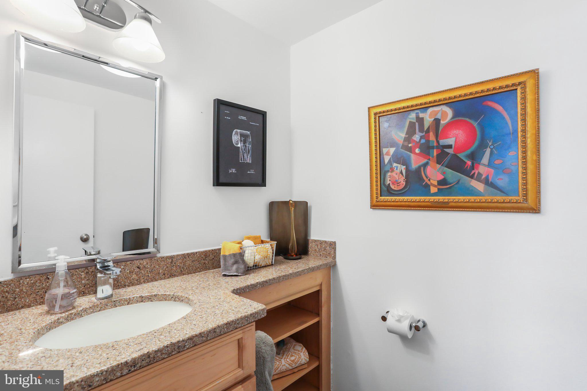 1634 Wainwright Drive Reston, VA 20190 - Photo 9 of 62 Half bath on main level