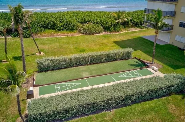 a view of a yard with an outdoor space