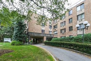 a view of a building with a garden