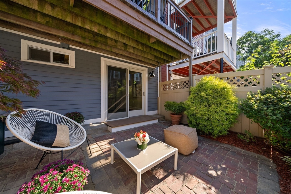 11 Wall Street Boston, MA 02129 - Photo 15 of 33 a backyard of a house with outdoor seating