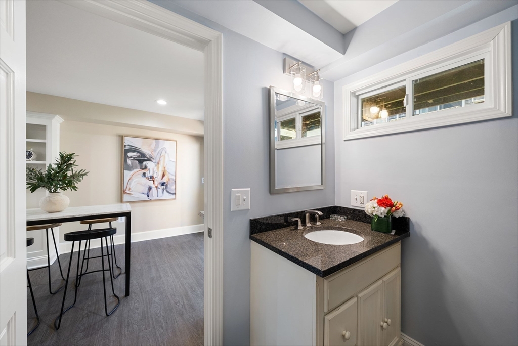 11 Wall Street Boston, MA 02129 - Photo 16 of 33 a bathroom with a sink and a stove