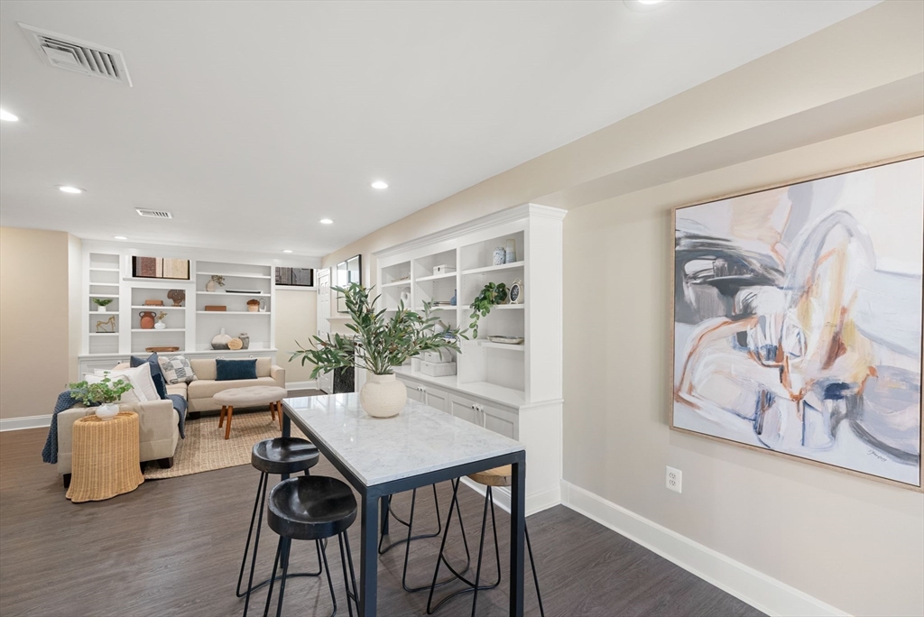 11 Wall Street Boston, MA 02129 - Photo 18 of 33 a living room with furniture and wooden floor