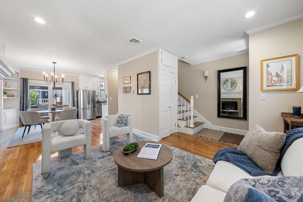 11 Wall Street Boston, MA 02129 - Photo 2 of 33 a living room with furniture and wooden floor