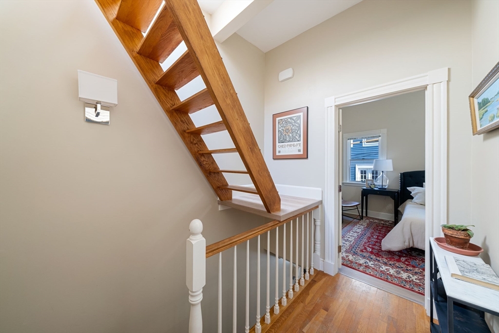 11 Wall Street Boston, MA 02129 - Photo 28 of 33 a view of a hallway with wooden floor and stairs