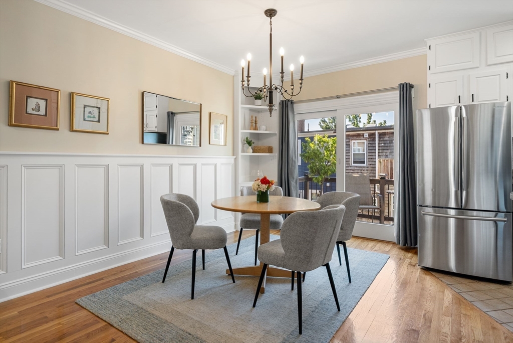 11 Wall Street Boston, MA 02129 - Photo 6 of 33 a view of a dining room with furniture window and wooden floor