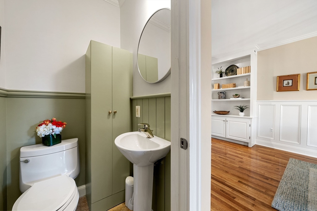 11 Wall Street Boston, MA 02129 - Photo 7 of 33 a bathroom with a sink toilet and a mirror