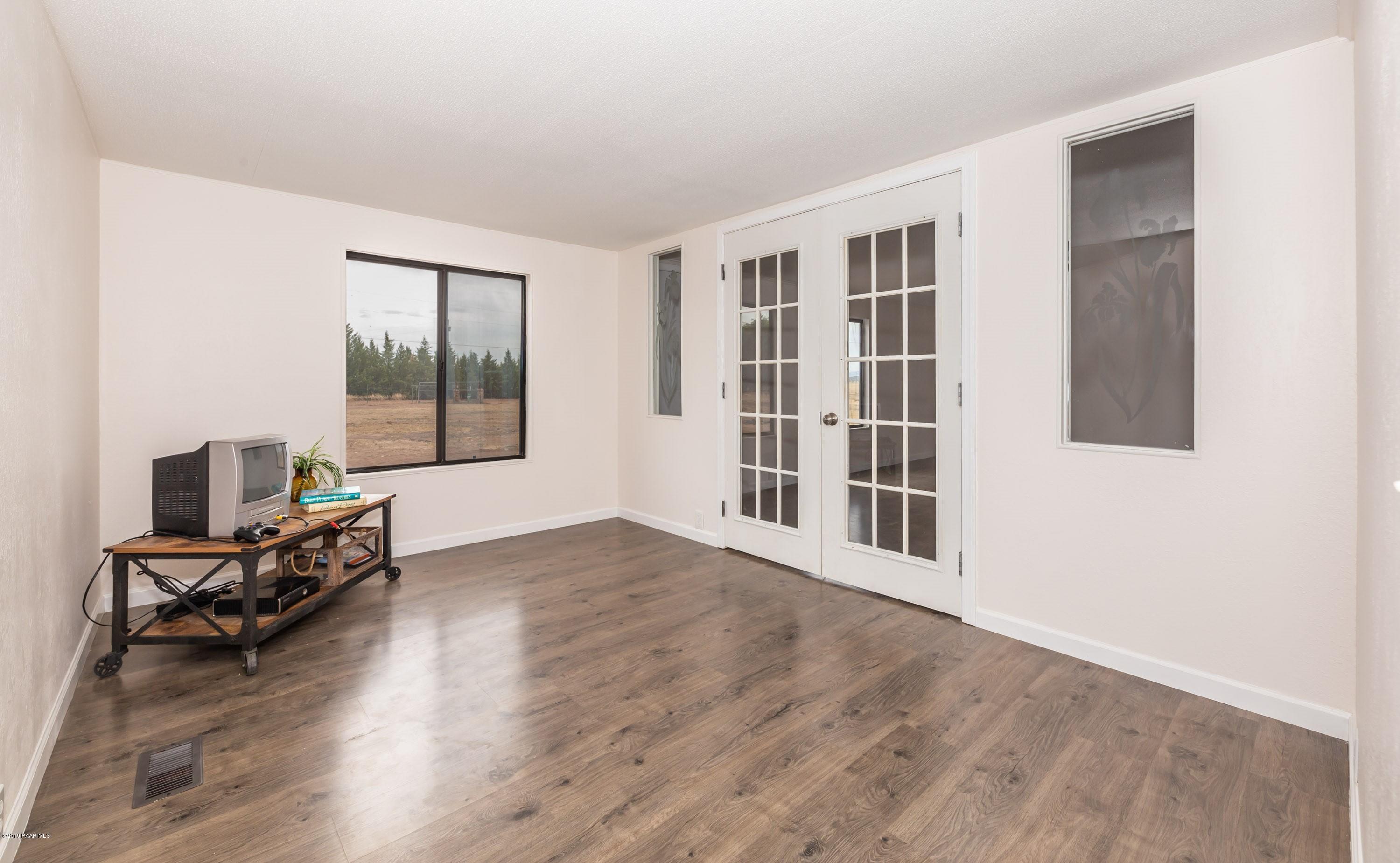 25156 North Stump Road Paulden, AZ 86334 - Photo 11 of 17 a view of workspace with wooden floor and windows