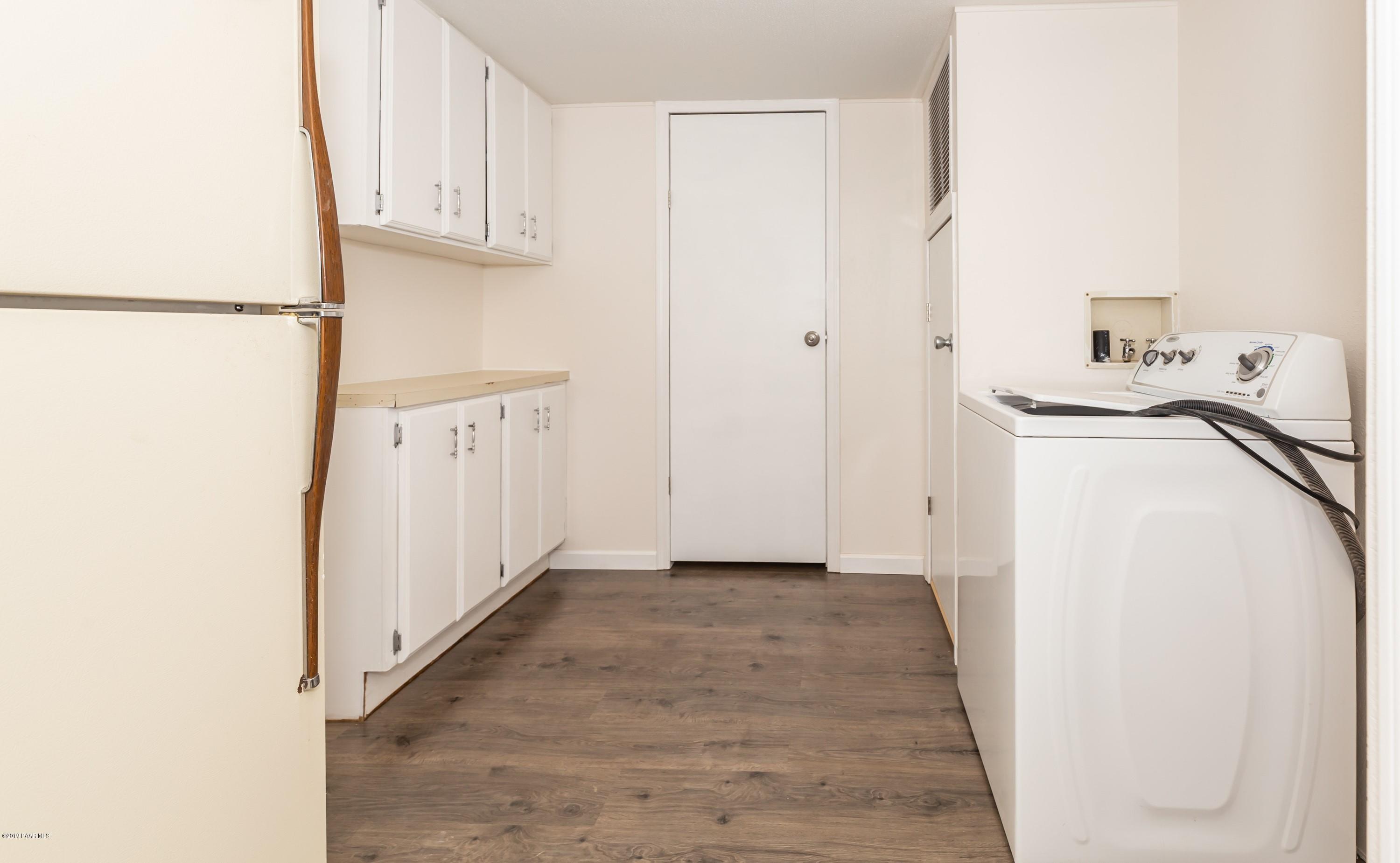 25156 North Stump Road Paulden, AZ 86334 - Photo 14 of 17 a view of a kitchen with white cabinets