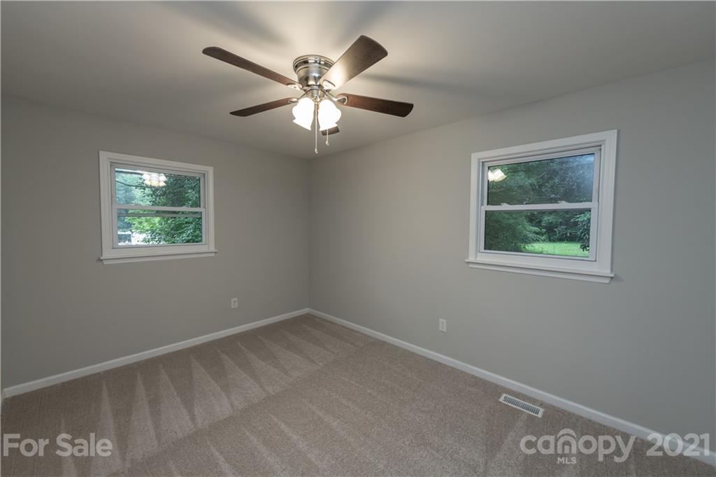 1060 Dunlap Roddey Road Rock Hill, SC 29730 - Photo 19 of 30 a view of a big room with wooden floor and windows