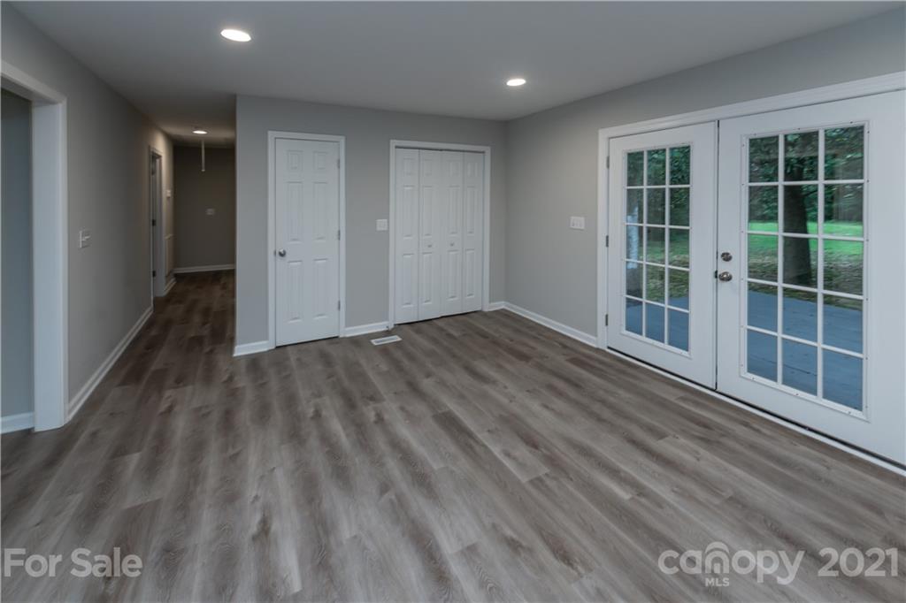 1060 Dunlap Roddey Road Rock Hill, SC 29730 - Photo 8 of 30 a view of a room with wooden floor and windows