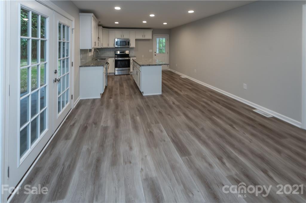 1060 Dunlap Roddey Road Rock Hill, SC 29730 - Photo 9 of 30 a view of kitchen with wooden floor and electronic appliances