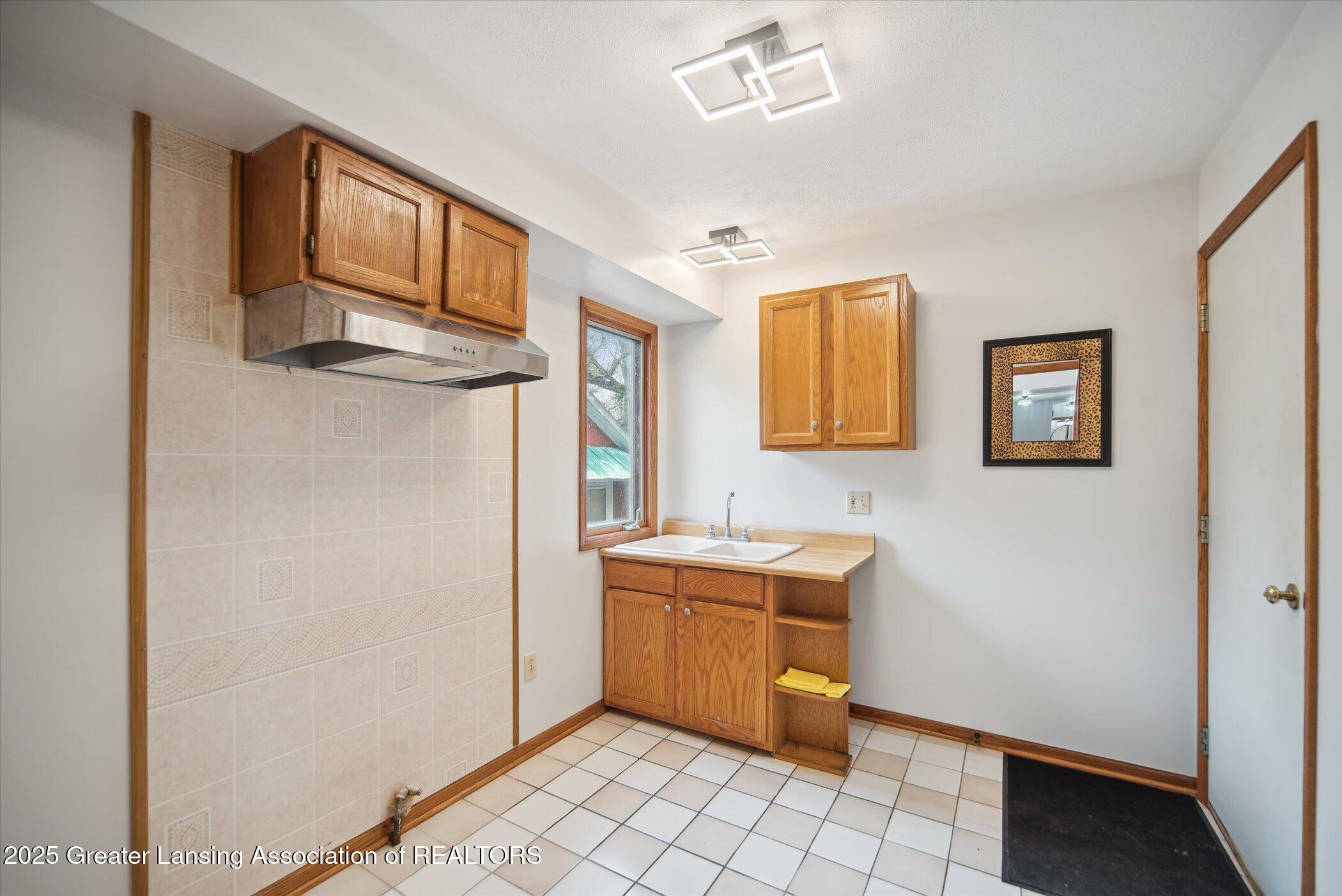 2711 Pine Tree Road Holt, MI 48842 - Photo 13 of 37 18-2711-Pine-Tree-Rd-Holt-MI-48842-Windo
