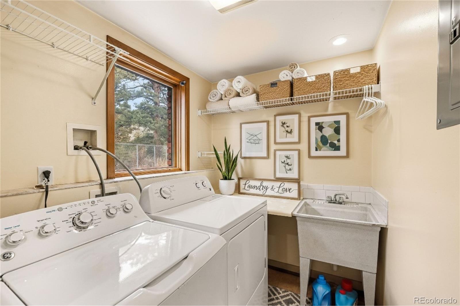 6094 Pyrenees Trail Golden, CO 80403 - Photo 13 of 24 a bathroom with a sink vanity and a mirror