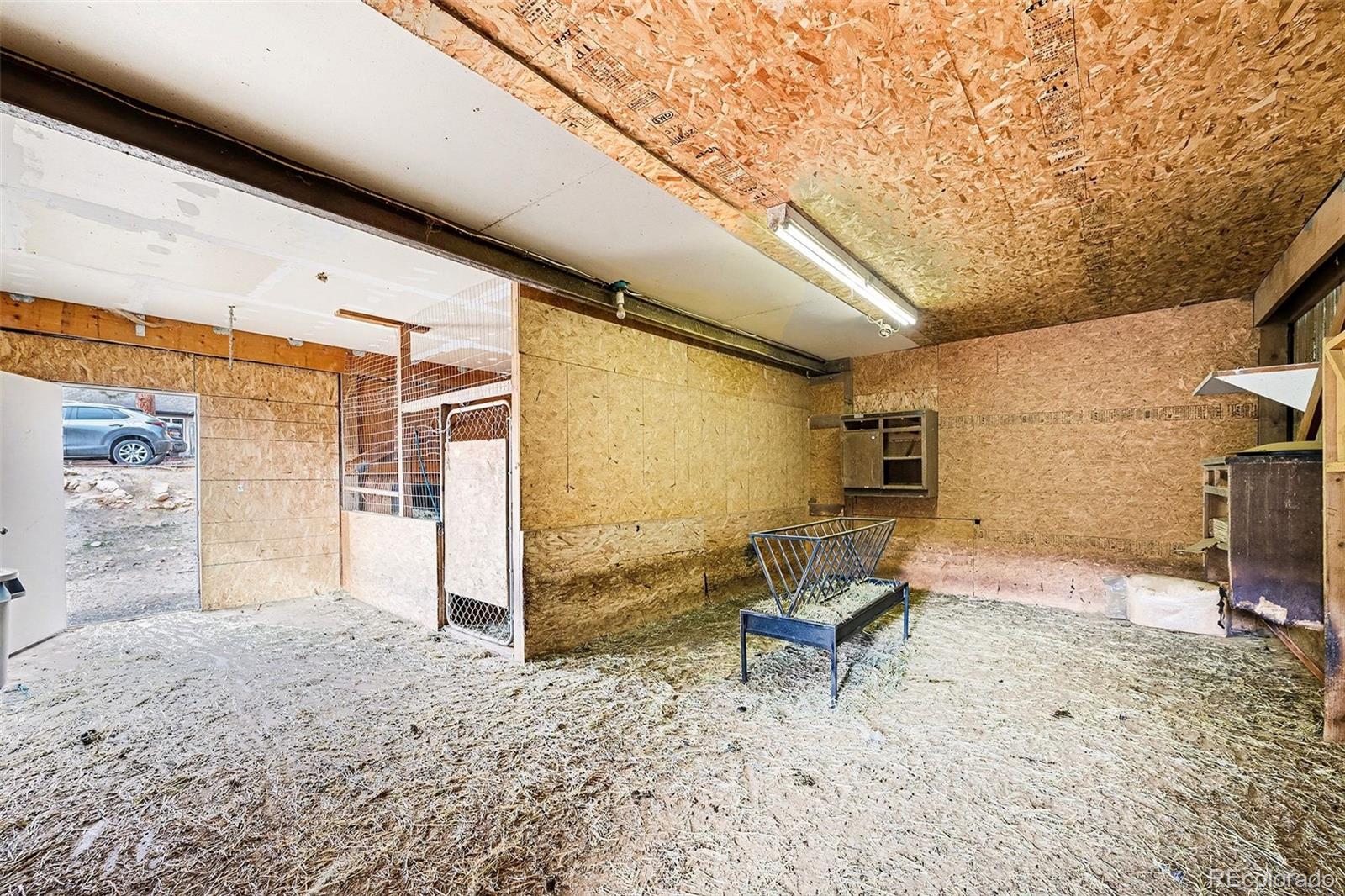6094 Pyrenees Trail Golden, CO 80403 - Photo 16 of 24 a living room with a rug