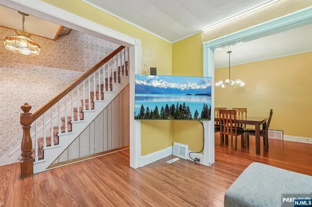 a kitchen with stainless steel appliances granite countertop a stove and a sink