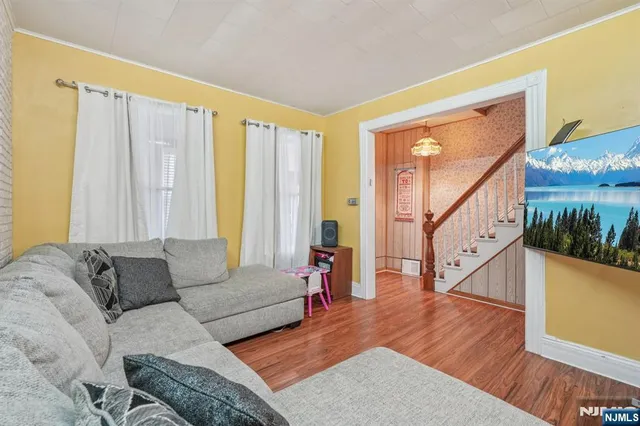 a kitchen with a stove a refrigerator and a cabinets