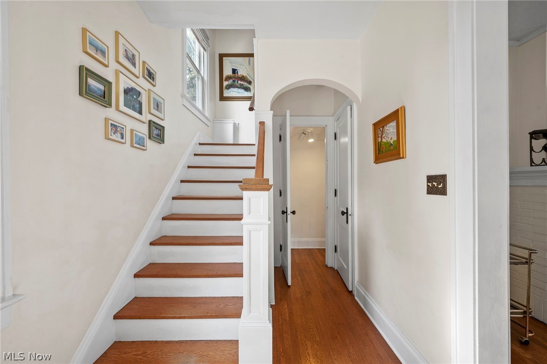 2941 Coleridge Road Cleveland, OH 44118 - Photo 2 of 42 Staircase featuring wood-type flooring
