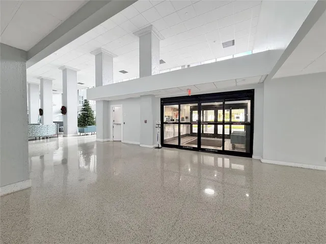 a view of a water heater room with a fireplace