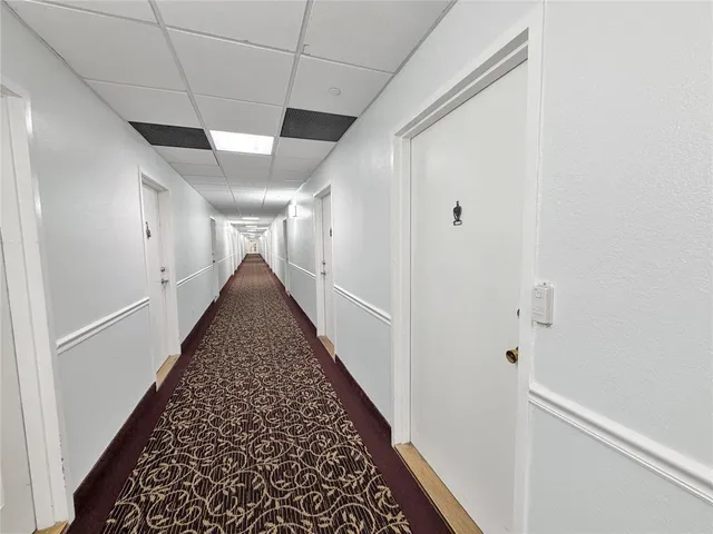 a view of swimming pool from a balcony