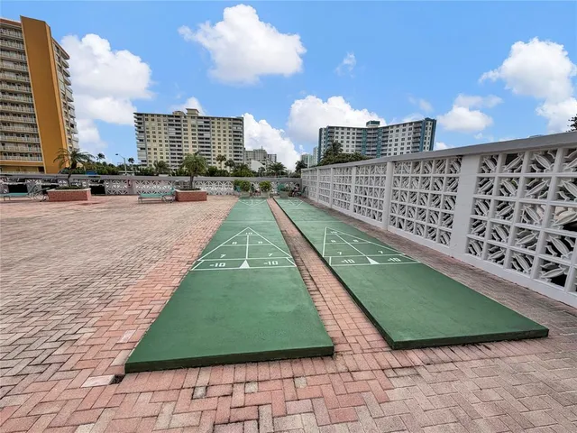 a view of a terrace with sitting area