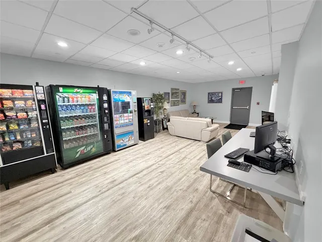 a room with furniture and a flat screen tv