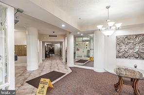 614 Chestnut Street Palmyra, NJ 08065 - Photo 15 of 17 a lobby with furniture and a chandelier
