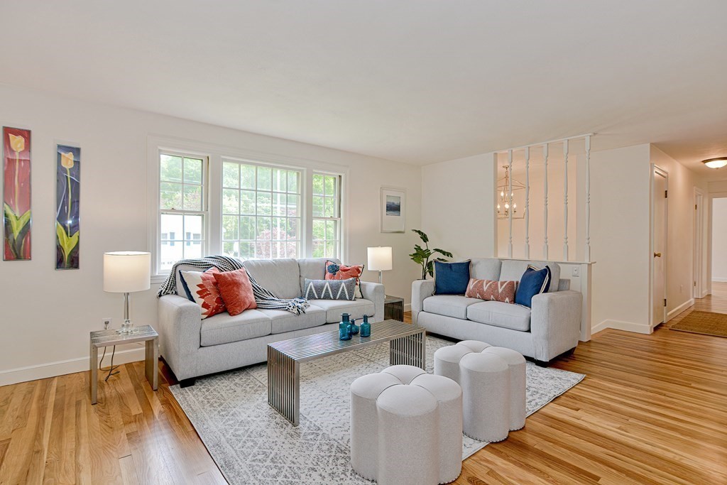 105 Booth Road Dedham, MA 02026 - Photo 8 of 39 a living room with furniture and a large window