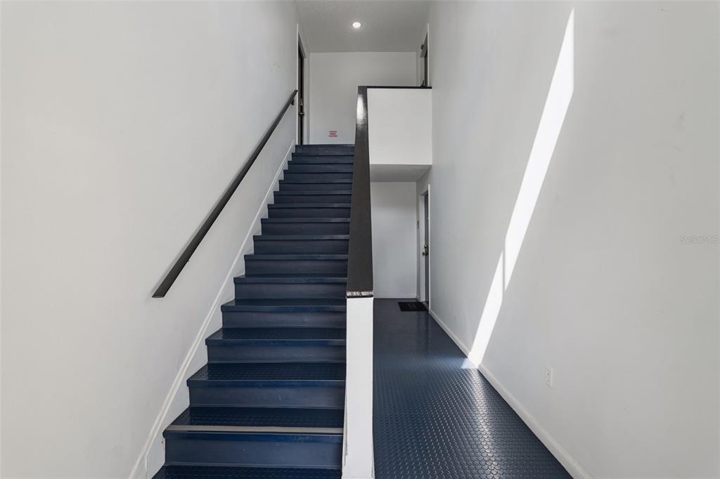 525 South Conway Road, Unit 202 Orlando, FL 32807 - Photo 3 of 34 a view of entryway with wooden floor