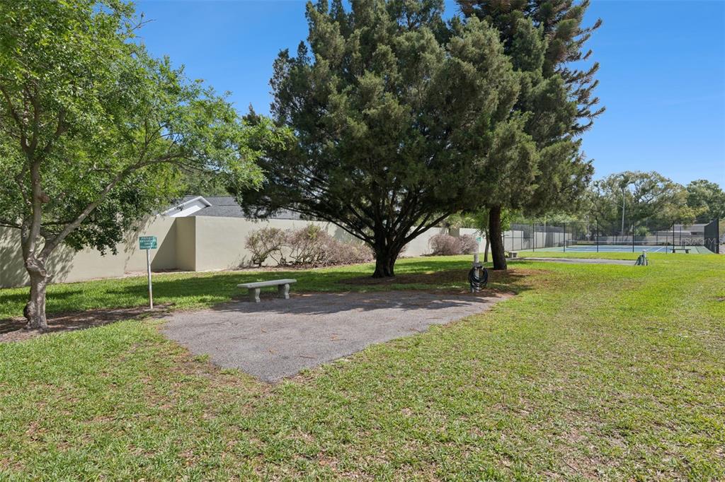 525 South Conway Road, Unit 202 Orlando, FL 32807 - Photo 33 of 34 a view of a yard with a house