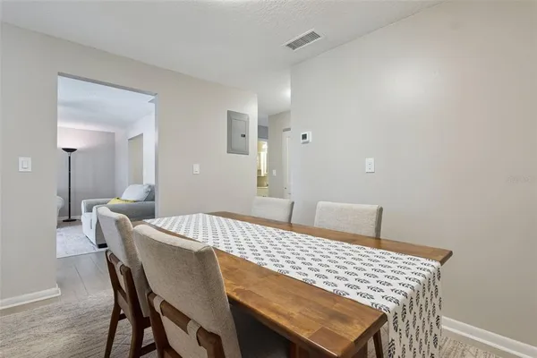 a view of a dining room with furniture