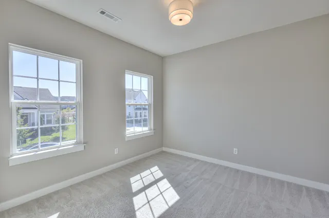 a bathroom with a bathtub shower sink and a mirror