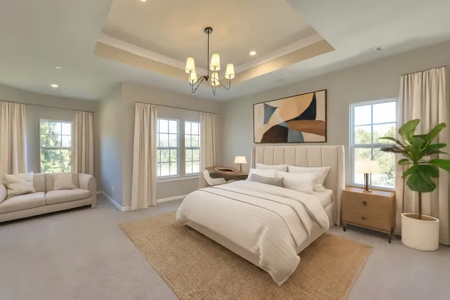 a bathroom with a tub shower and sink