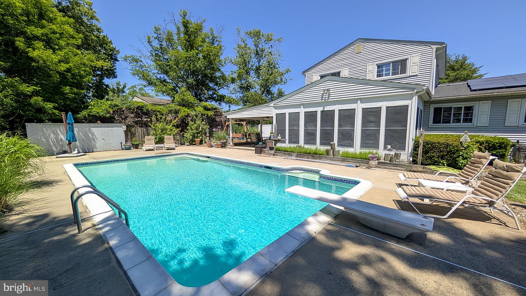 9 Wolfpack Road Hamilton, NJ 08619 - Photo 4 of 57 Sunny oasis with inviting poolside.